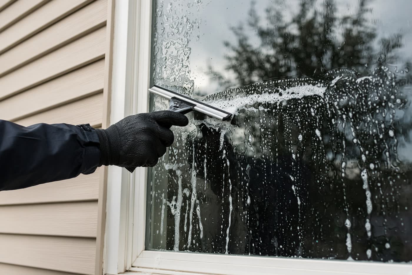 Storefront glass being cleaned